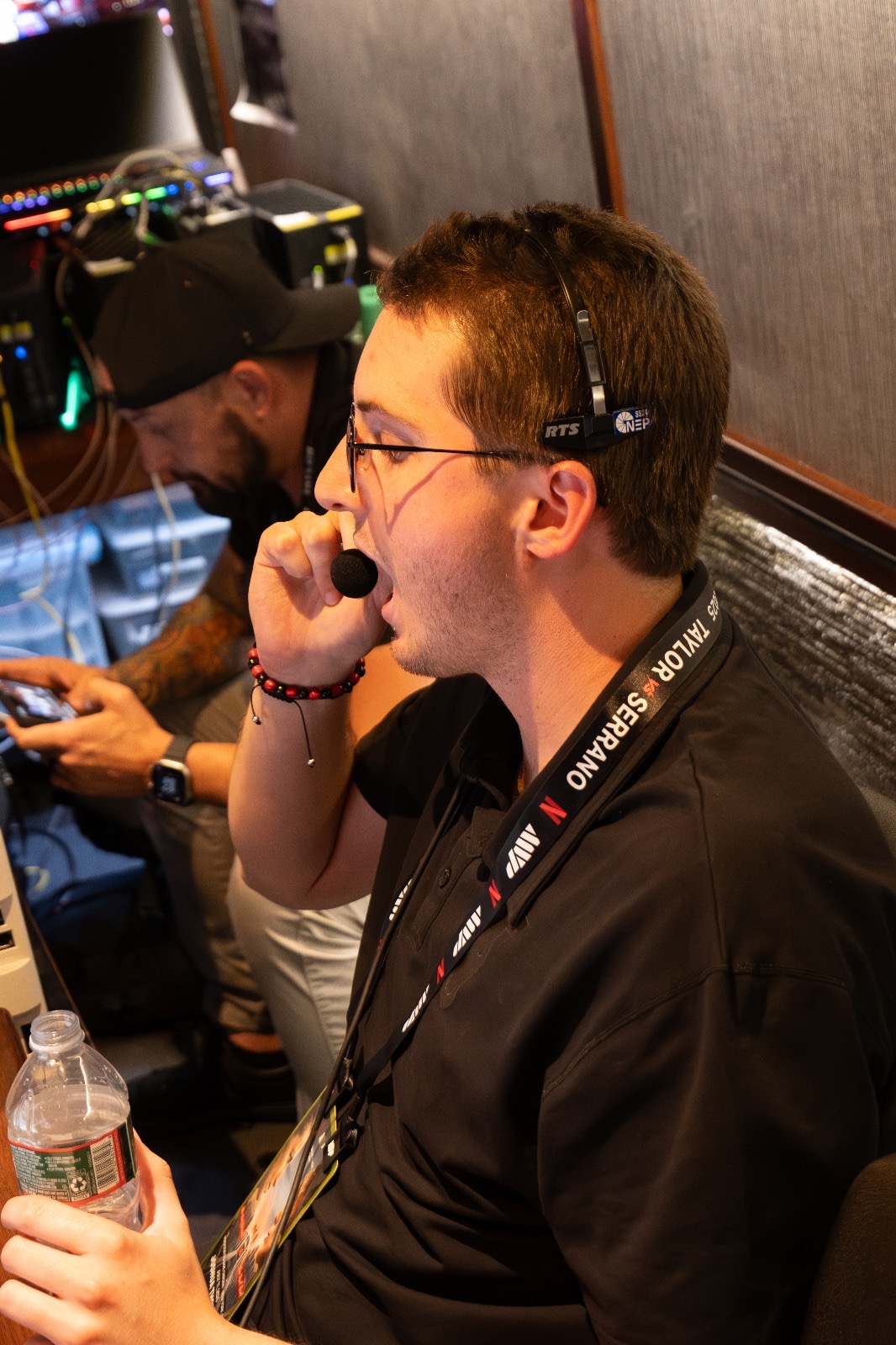 Graphics Operator speaking into a headset